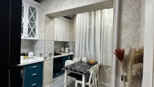 Бакы, старое здание 5 комната, продажа, 120 м²  , Сураханы рајону, Јени Ҝүнәшли гәс.